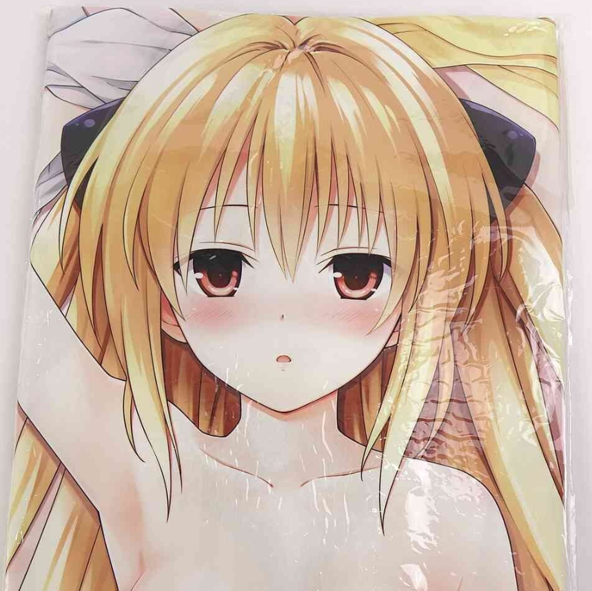 Close-up illustration of a blonde-haired anime girl with red eyes and a blush.
