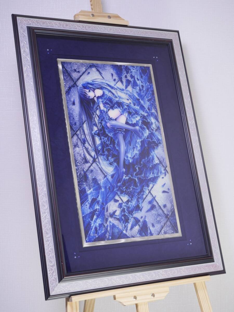 Framed blue-toned anime illustration on an easel, with a silver frame and purple matting.