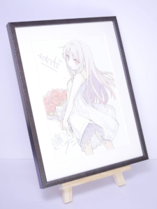 Framed anime illustration of a girl in a white dress with long light hair, standing with a bouquet of roses in the background on a wooden easel.