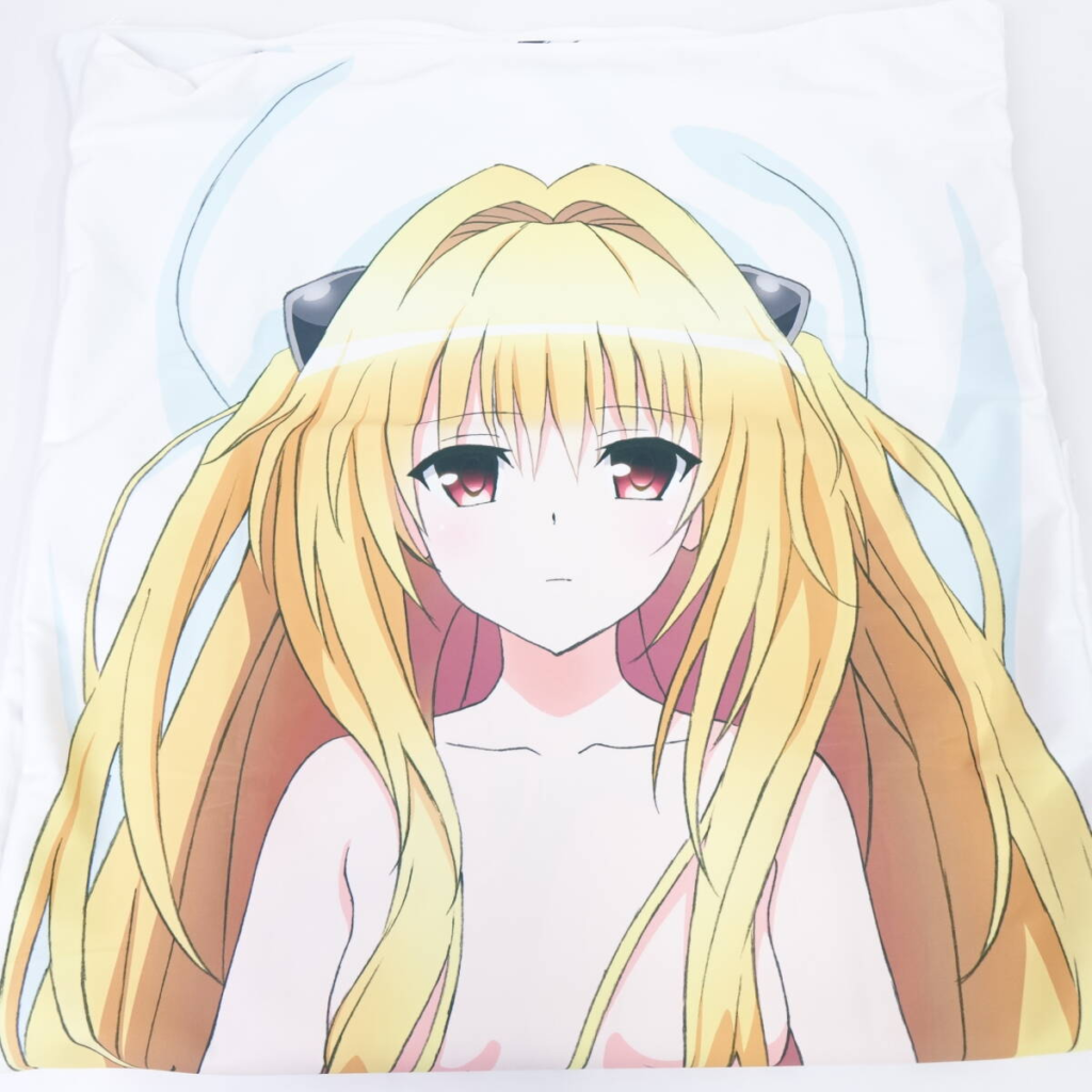 Illustration of a blonde anime girl with red eyes, shown from the shoulders up, on a white pillowcase background.
