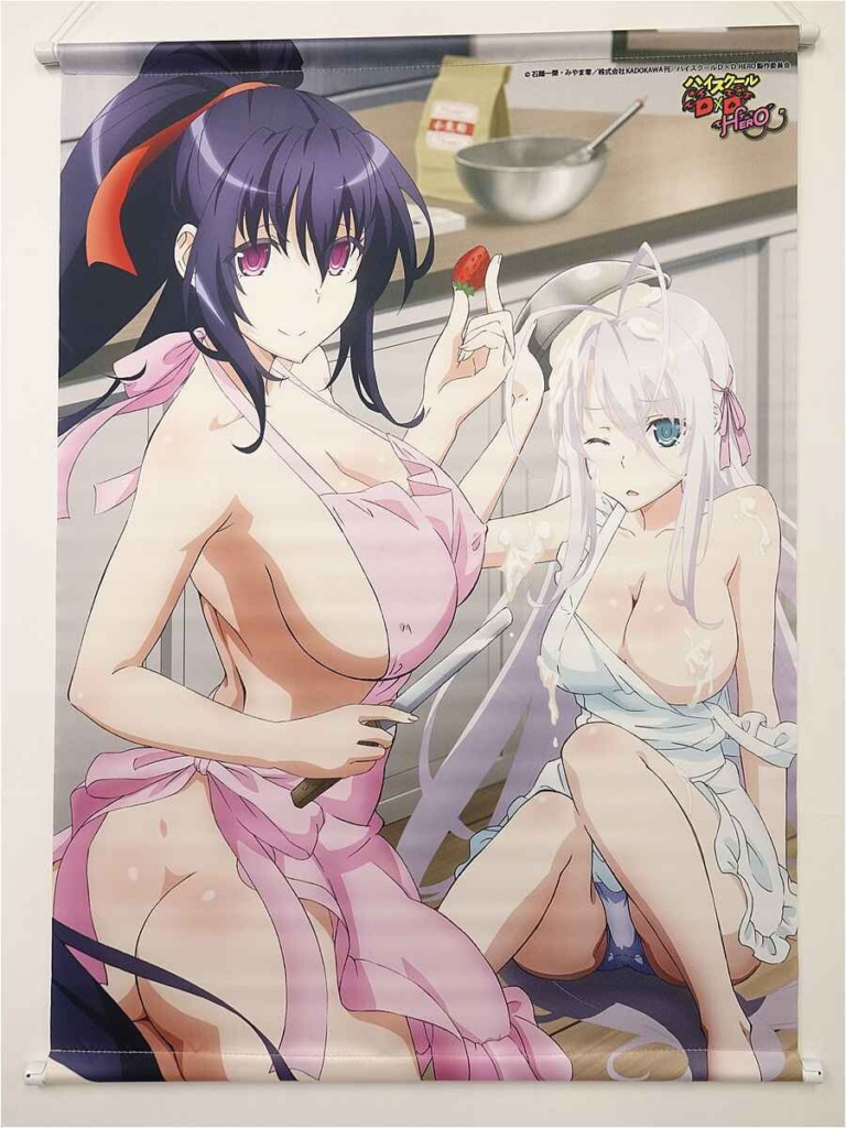 Anime poster showing two scantily clad women in a kitchen; dark-haired woman holds a knife and a strawberry near the pale-haired woman, who sits with a towel wrapped around her.