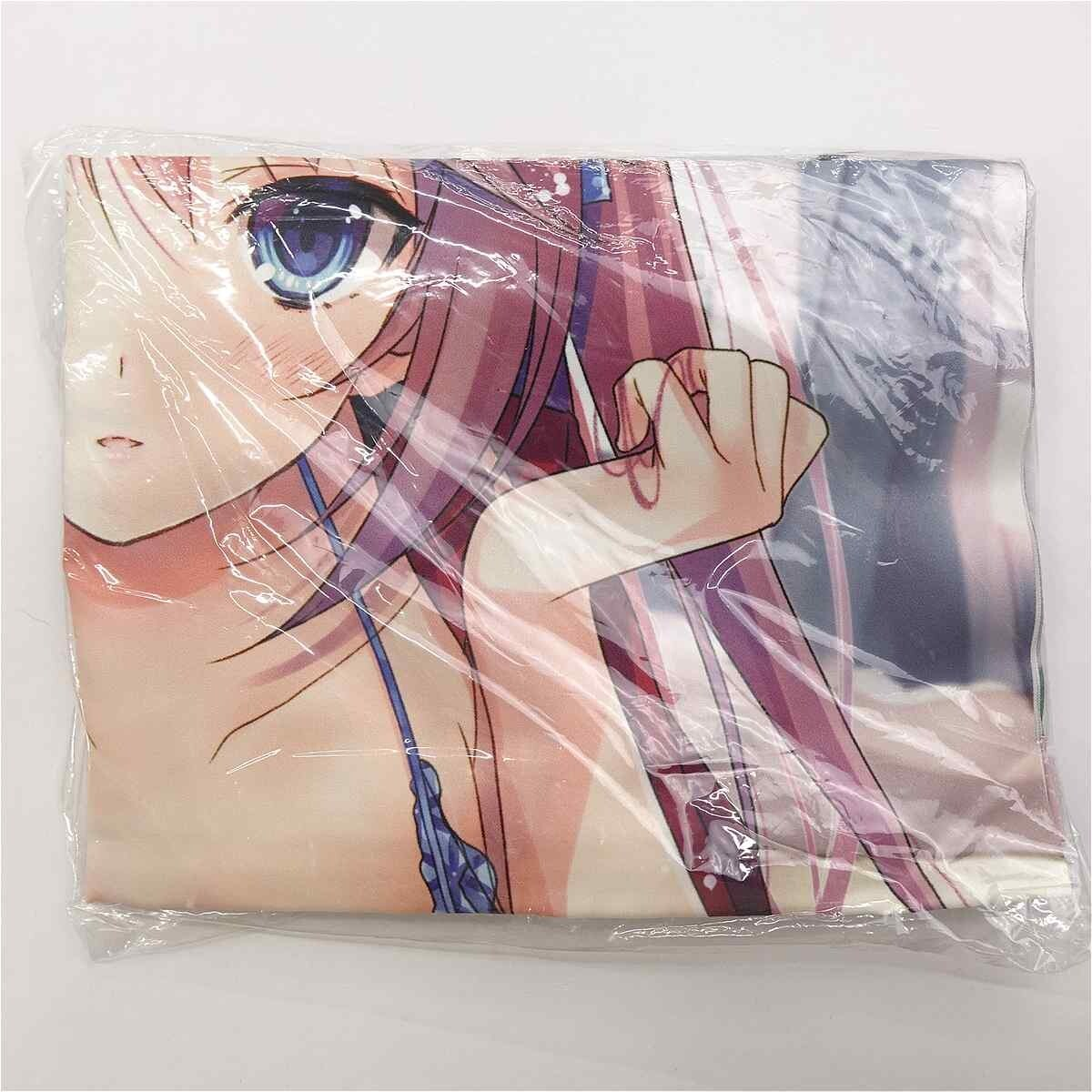 Close-up of an anime-style gowned girl with blue eye and pink hair printed on folded fabric in plastic wrap (product image).