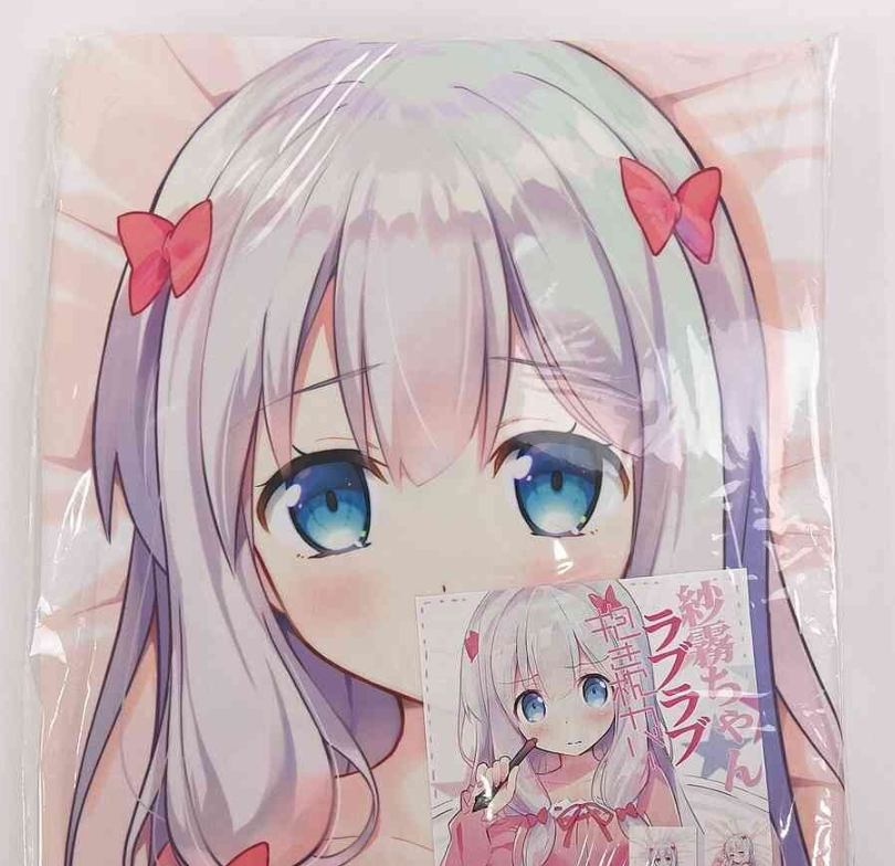 Close-up illustration of a cute anime girl with long silver hair, large blue eyes, and pink bow clips, wrapped in plastic and a smaller printed image held in front.